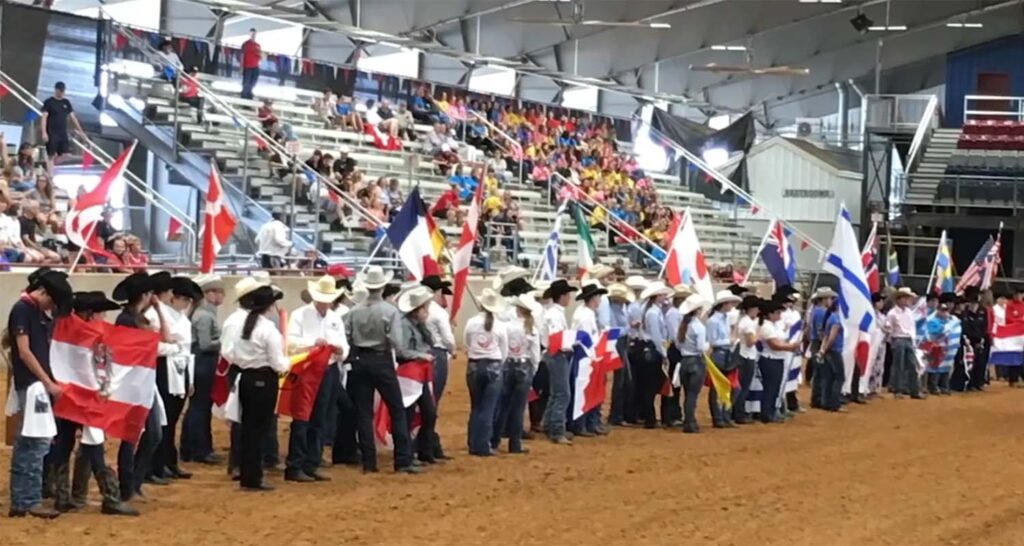 Promo image of the Brazos County Expo Complex, specifically the north arena with lots of people on the arena floor.